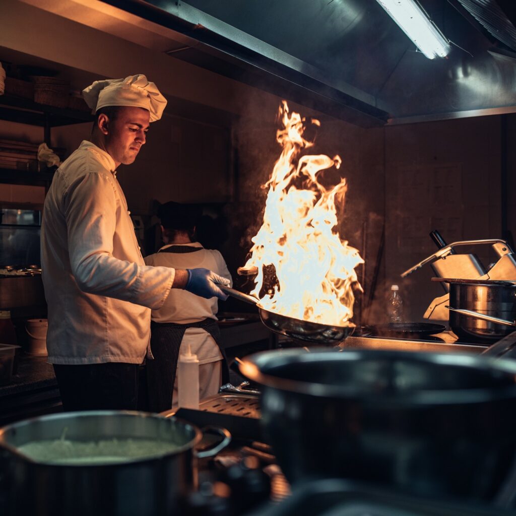 Shot of a chef cooking in a professional kitchen